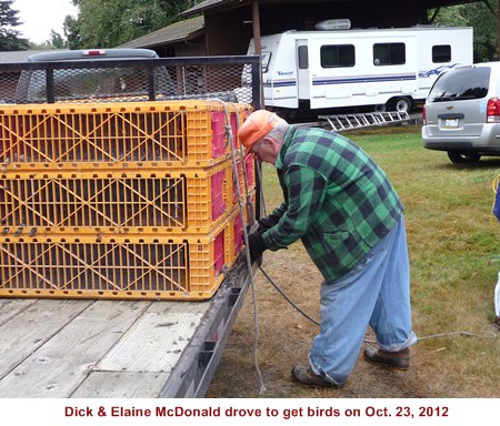 Bill Raines ties crates down